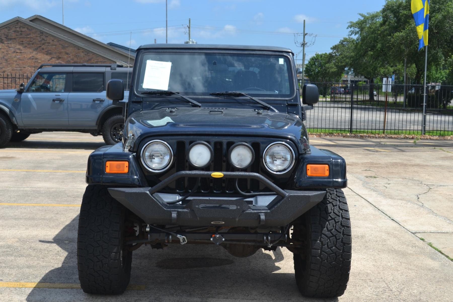2003 BLACK /BLACK Jeep Wrangler X (1J4FA39S13P) with an 4.0L L6 OHV 12V engine, 4-Speed Automatic | 5-Speed Manual transmission, located at 1355 North 11th Street, Beaumont, 77702, (409) 832-0006, 30.094290, -94.130096 - Photo #7